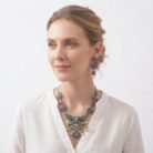 Beautiful oxidised silver necklace set featuring pink teardrop stones, lotus-inspired motifs, an intricate peacock pendant, and matching earrings.